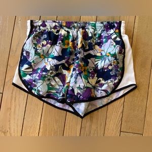 Girls Large Nike DRI FIT running shorts. Floral